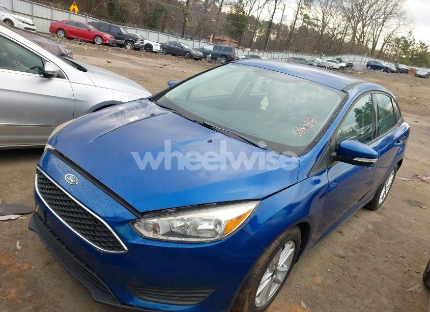 Photo 2 of 2018 Ford Focus SE (VIN 1FADP3FE8JL318861)