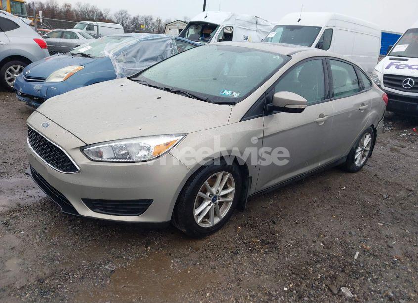 Photo 2 of 2016 Ford Focus SE (VIN 1FADP3FE9GL232533)