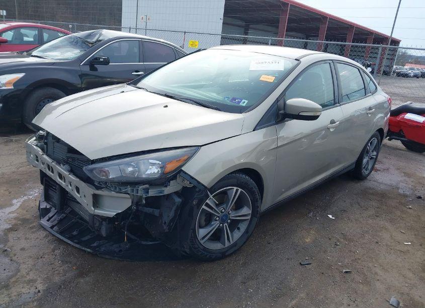 Photo 2 of 2016 Ford Focus SE (VIN 1FADP3FE9GL237327)
