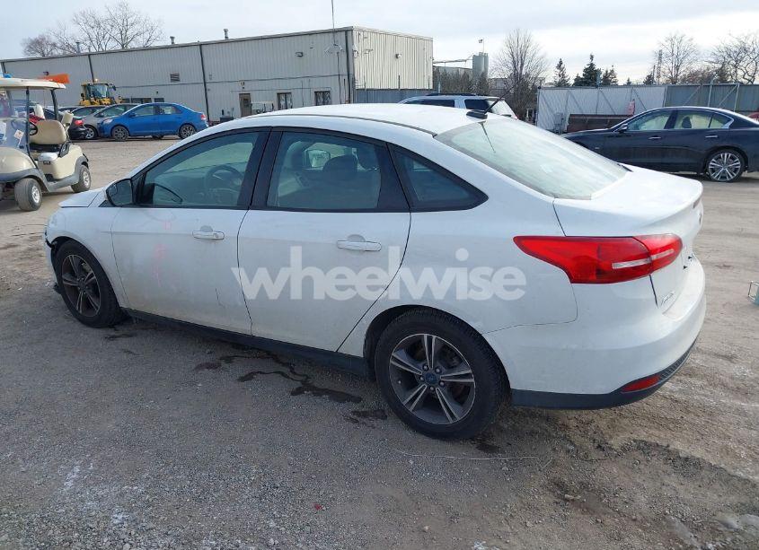 Photo 3 of 2016 Ford Focus SE (VIN 1FADP3FE9GL371660)