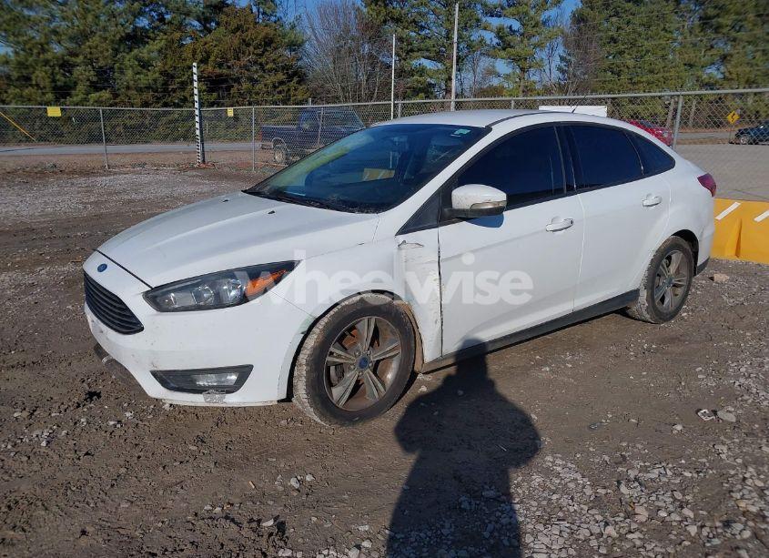 Photo 2 of 2016 Ford Focus SE (VIN 1FADP3FE9GL399281)