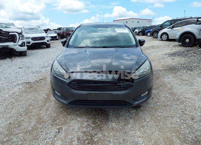Photo 12 of 2017 Ford Focus SE (VIN 1FADP3FE9HL214504)