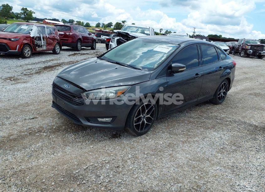 Photo 2 of 2017 Ford Focus SE (VIN 1FADP3FE9HL214504)