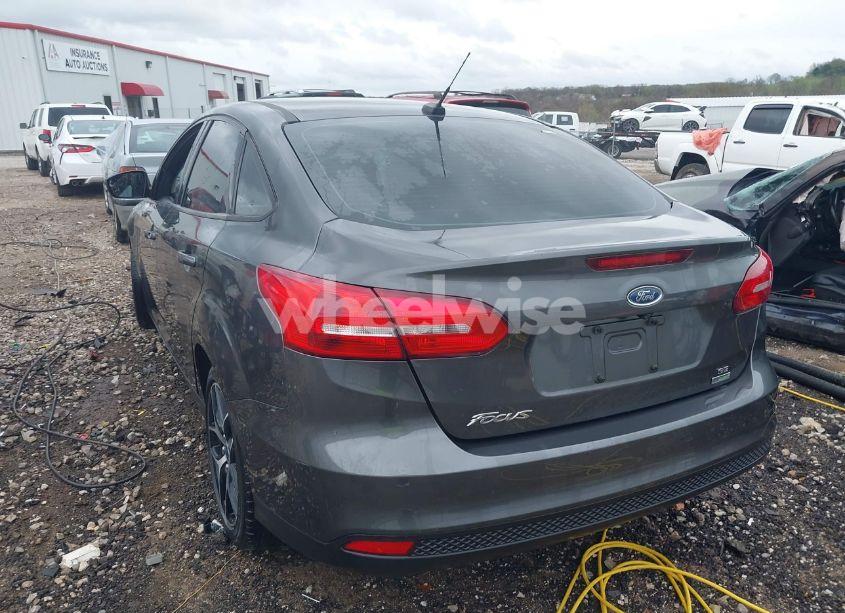 Photo 3 of 2017 Ford Focus SE (VIN 1FADP3FE9HL214504)