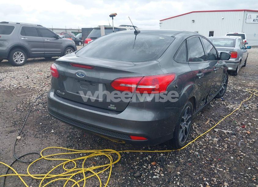 Photo 4 of 2017 Ford Focus SE (VIN 1FADP3FE9HL214504)