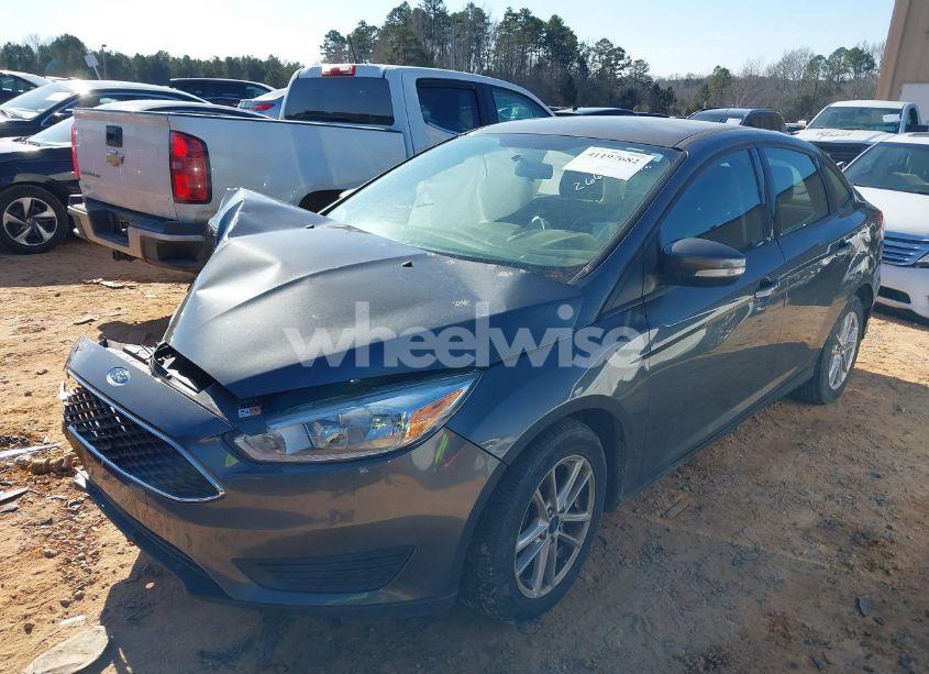 Photo 2 of 2017 Ford Focus SE (VIN 1FADP3FE9HL266179)