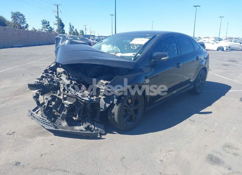 Photo 2 of 2017 Ford Focus SE (VIN 1FADP3FE9HL308334)