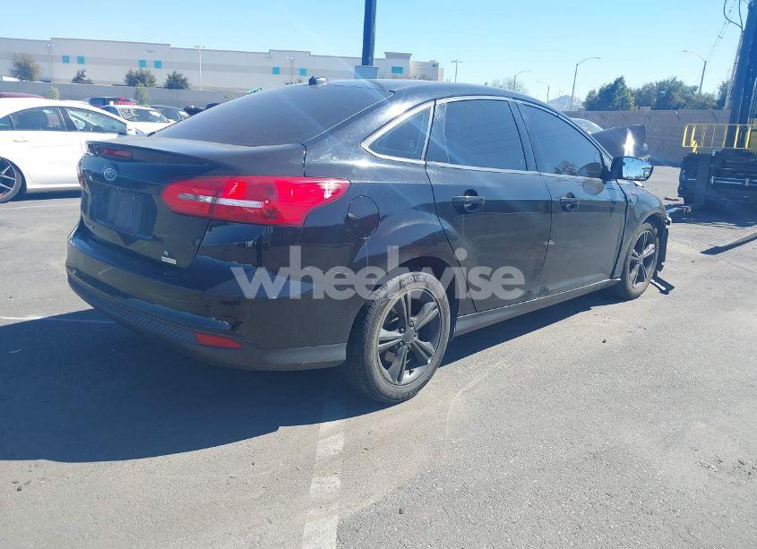 Photo 4 of 2017 Ford Focus SE (VIN 1FADP3FE9HL308334)