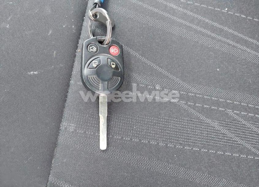 Photo 11 of 2018 Ford Focus SE (VIN 1FADP3FE9JL244026)