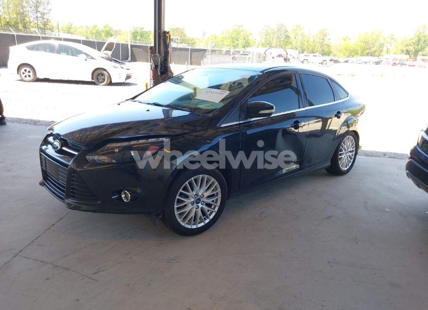 Photo 2 of 2013 Ford Focus TITANIUM (VIN 1FADP3J20DL143491)