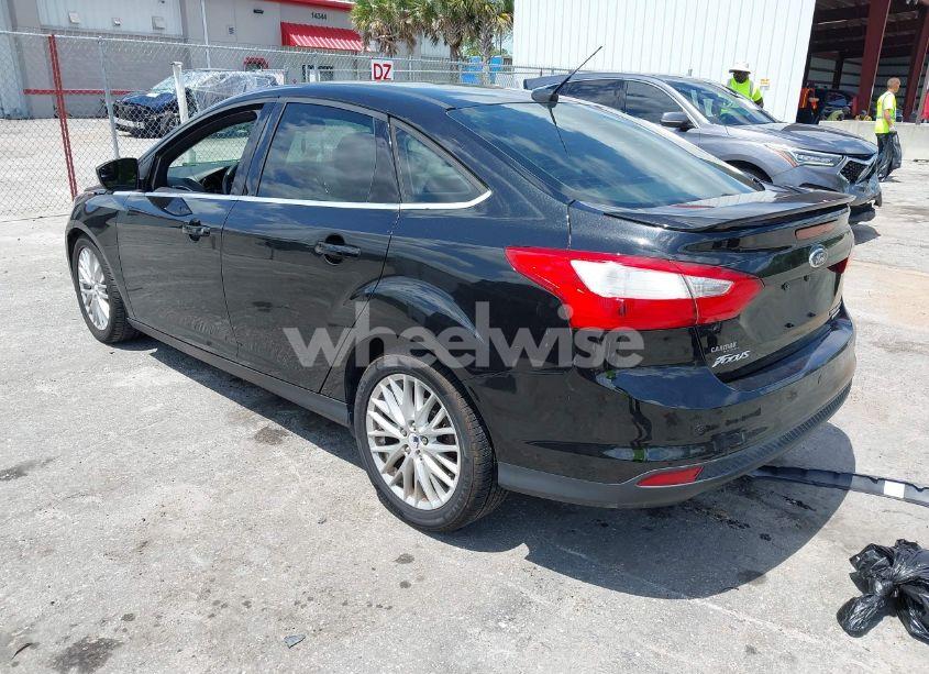 Photo 3 of 2013 Ford Focus TITANIUM (VIN 1FADP3J20DL305717)