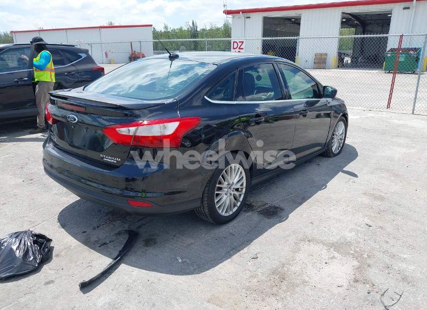 Photo 4 of 2013 Ford Focus TITANIUM (VIN 1FADP3J20DL305717)