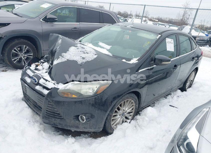 Photo 2 of 2013 Ford Focus TITANIUM (VIN 1FADP3J20DL380224)