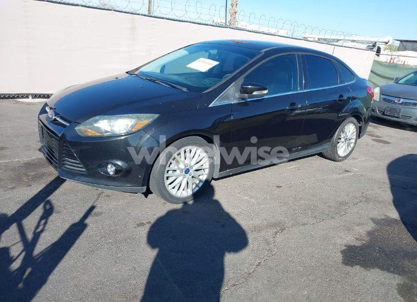 Photo 2 of 2013 Ford Focus TITANIUM (VIN 1FADP3J21DL106840)