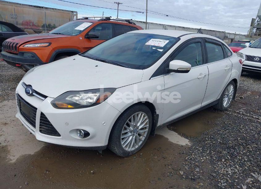Photo 2 of 2013 Ford Focus TITANIUM (VIN 1FADP3J21DL112055)