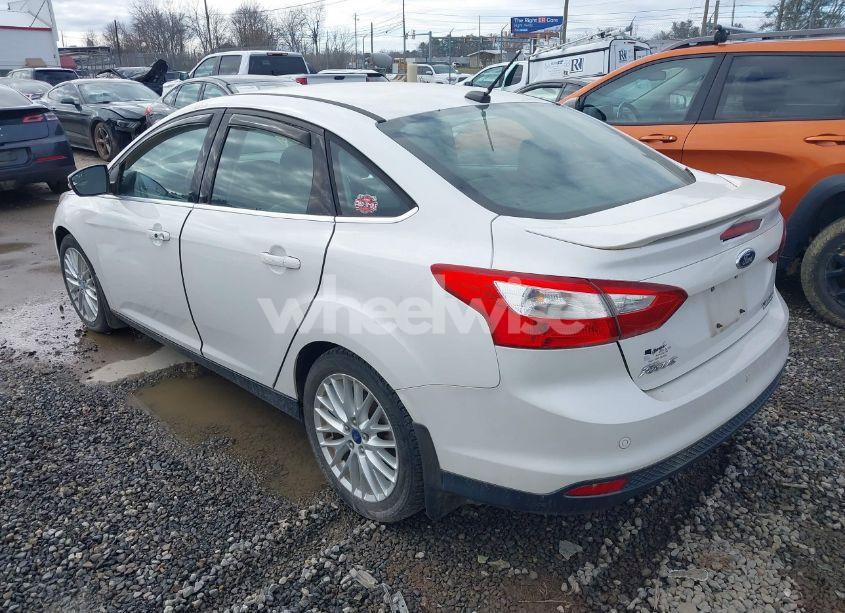 Photo 3 of 2013 Ford Focus TITANIUM (VIN 1FADP3J21DL112055)