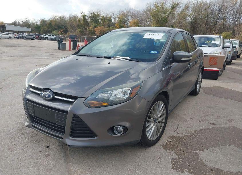 Photo 2 of 2013 Ford Focus TITANIUM (VIN 1FADP3J21DL378711)