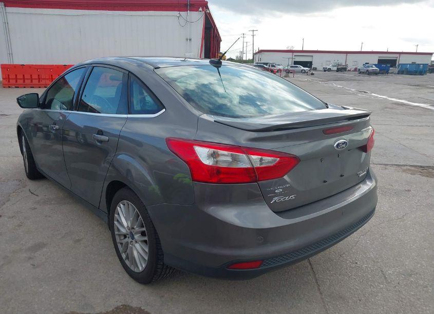 Photo 3 of 2013 Ford Focus TITANIUM (VIN 1FADP3J21DL378711)