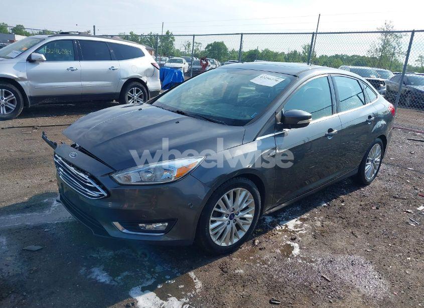 Photo 2 of 2017 Ford Focus TITANIUM (VIN 1FADP3J21HL203736)