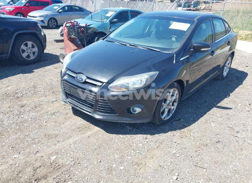 Photo 2 of 2013 Ford Focus TITANIUM (VIN 1FADP3J22DL106166)