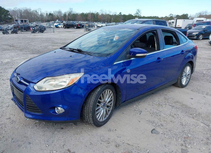 Photo 2 of 2013 Ford Focus TITANIUM (VIN 1FADP3J23DL150452)