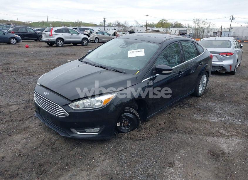 Photo 2 of 2016 Ford Focus TITANIUM (VIN 1FADP3J24GL224370)
