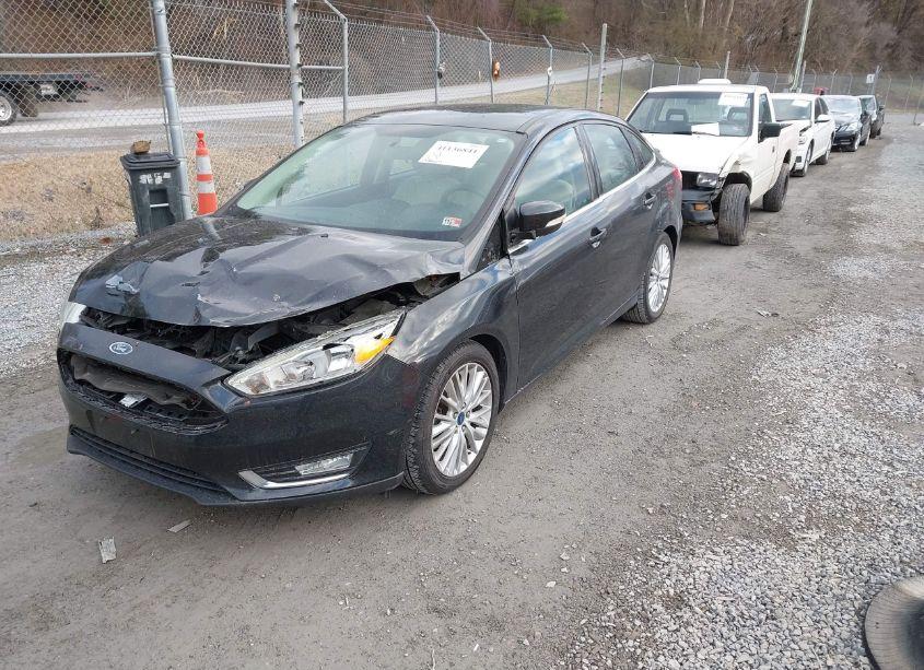 Photo 2 of 2015 Ford Focus TITANIUM (VIN 1FADP3J26FL323111)
