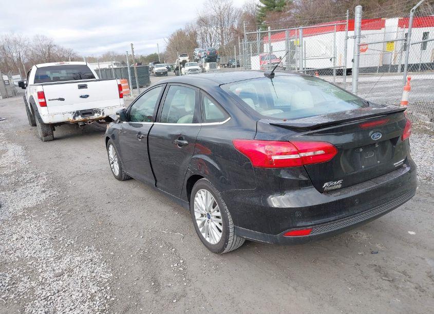 Photo 3 of 2015 Ford Focus TITANIUM (VIN 1FADP3J26FL323111)