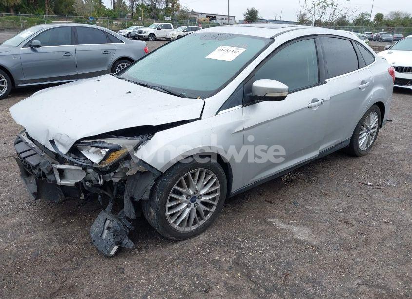 Photo 2 of 2013 Ford Focus TITANIUM (VIN 1FADP3J27DL338634)