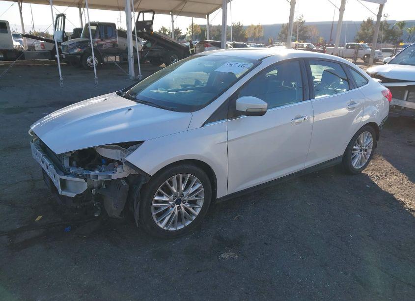 Photo 2 of 2015 Ford Focus TITANIUM (VIN 1FADP3J27FL341438)