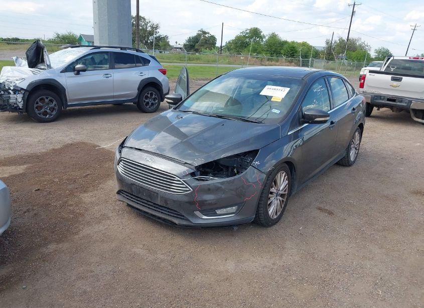 Photo 2 of 2017 Ford Focus TITANIUM (VIN 1FADP3J27HL238636)