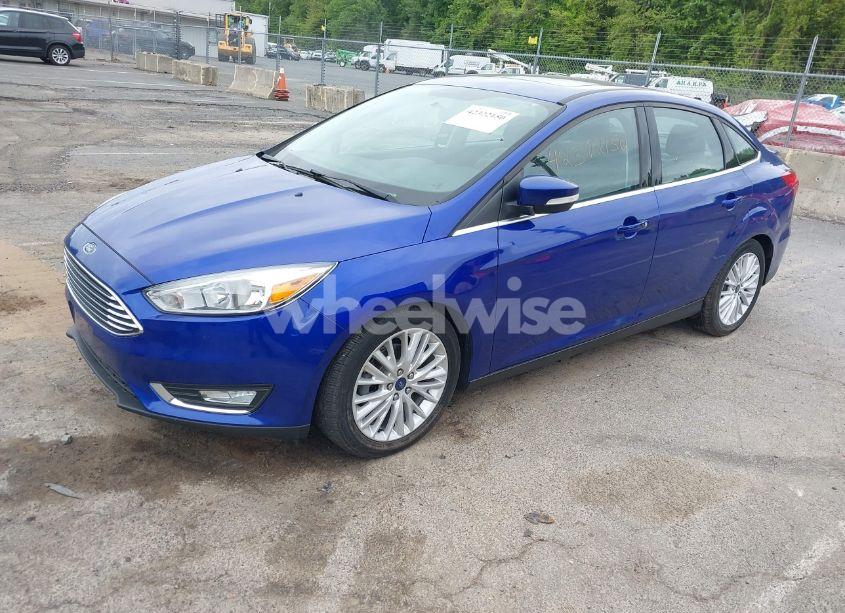 Photo 2 of 2015 Ford Focus TITANIUM (VIN 1FADP3J28FL380815)