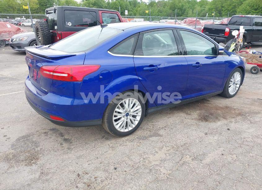 Photo 4 of 2015 Ford Focus TITANIUM (VIN 1FADP3J28FL380815)