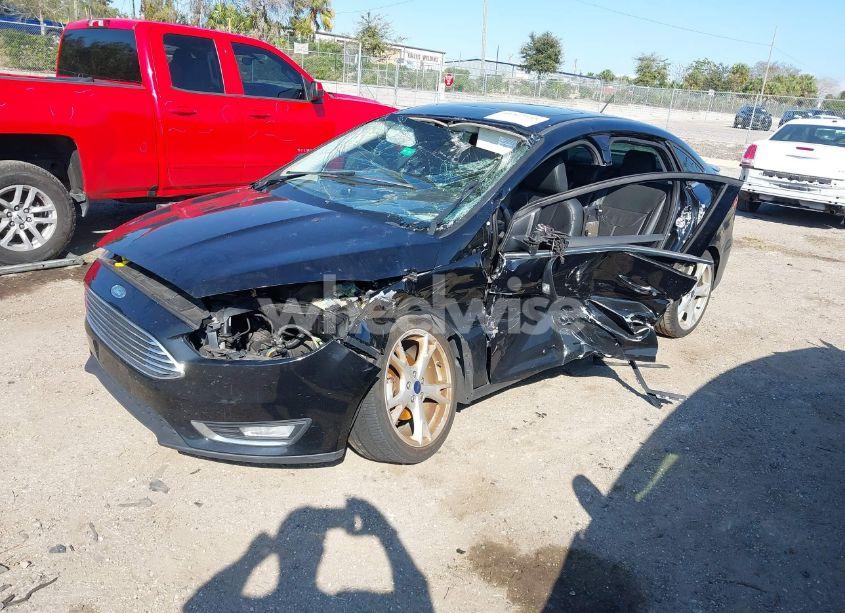 Photo 2 of 2016 Ford Focus TITANIUM (VIN 1FADP3J28GL335410)