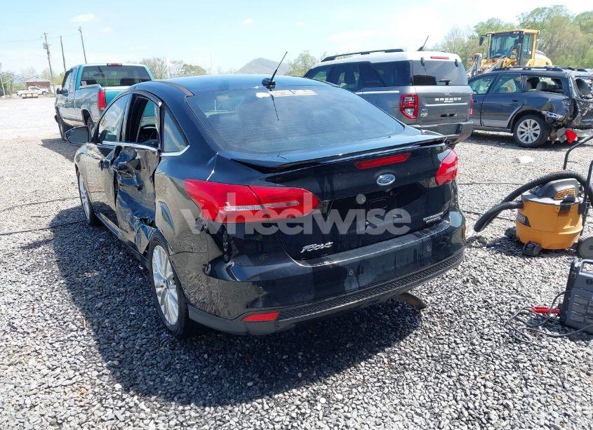 Photo 3 of 2016 Ford Focus TITANIUM (VIN 1FADP3J28GL393422)