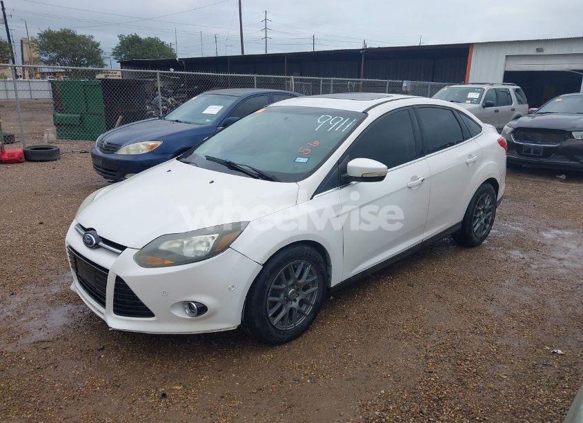 Photo 2 of 2013 Ford Focus TITANIUM (VIN 1FADP3J29DL209911)