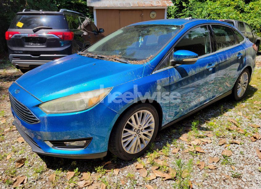 Photo 2 of 2015 Ford Focus (VIN 1FADP3J29FL239008)