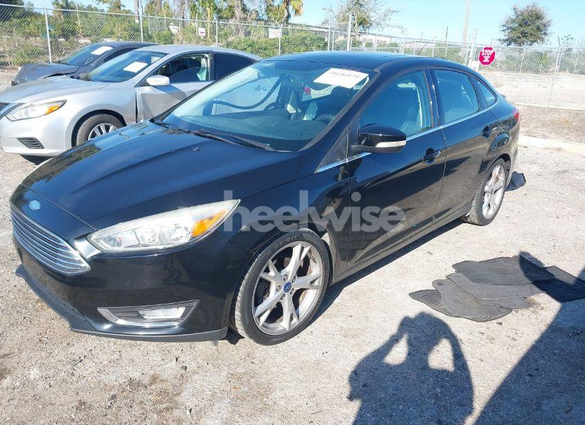 Photo 2 of 2016 Ford Focus TITANIUM (VIN 1FADP3J2XGL367968)