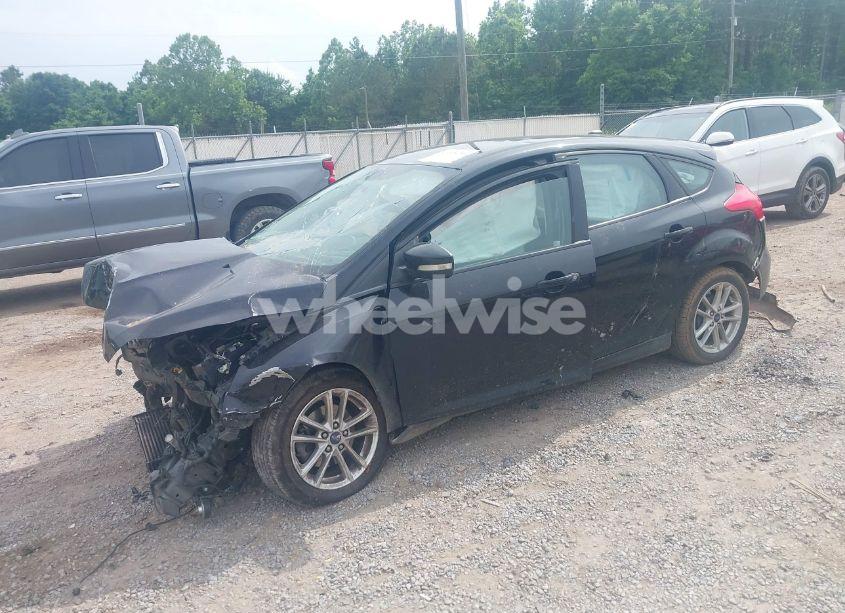 Photo 2 of 2016 Ford Focus SE (VIN 1FADP3K25GL290604)