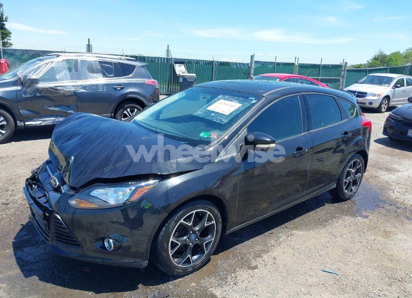 Photo 2 of 2013 Ford Focus SE (VIN 1FADP3K27DL104153)
