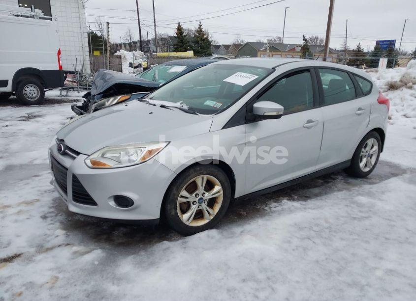 Photo 2 of 2013 Ford Focus SE (VIN 1FADP3K28DL146511)