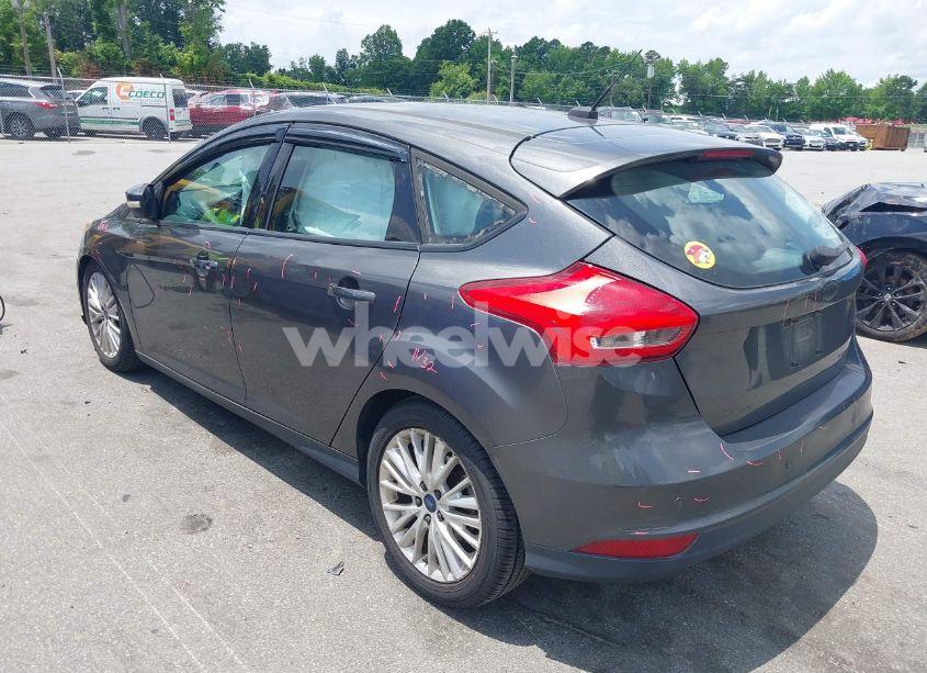 Photo 3 of 2016 Ford Focus TITANIUM (VIN 1FADP3N20GL275763)
