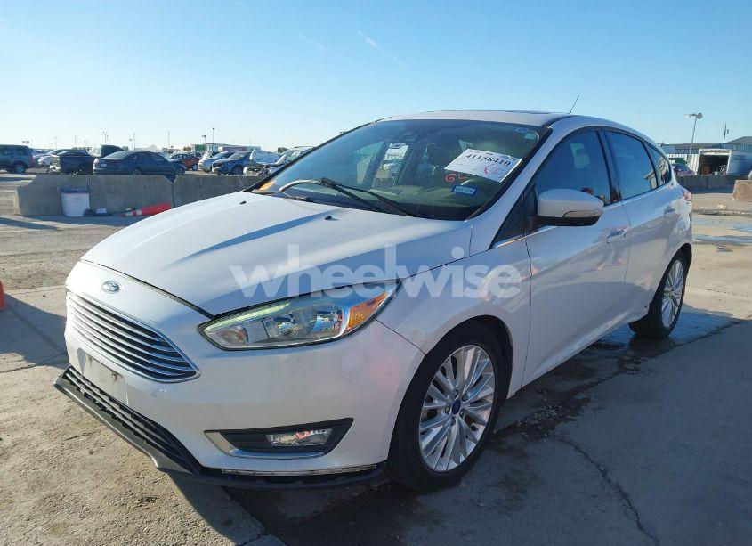 Photo 2 of 2017 Ford Focus TITANIUM (VIN 1FADP3N21HL309873)