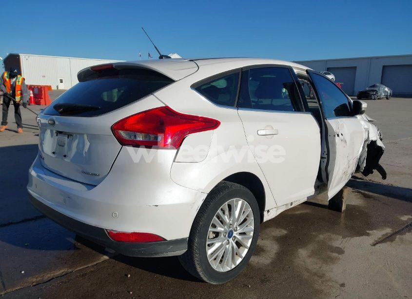 Photo 4 of 2017 Ford Focus TITANIUM (VIN 1FADP3N21HL309873)