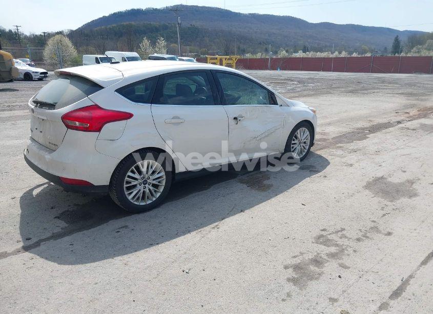 Photo 4 of 2017 Ford Focus TITANIUM (VIN 1FADP3N24HL331009)