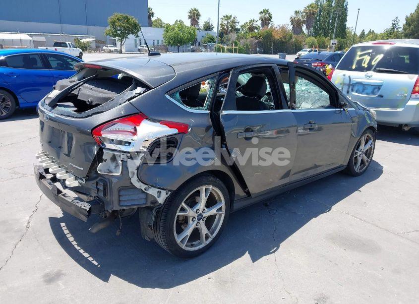 Photo 4 of 2015 Ford Focus TITANIUM (VIN 1FADP3N27FL380525)