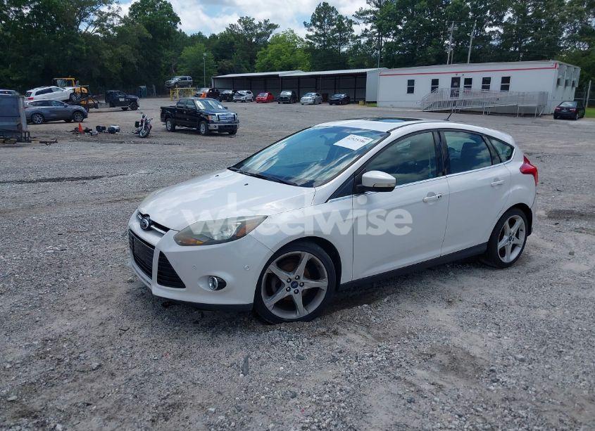 Photo 2 of 2013 Ford Focus TITANIUM (VIN 1FADP3N28DL335610)