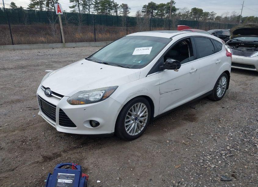 Photo 2 of 2013 Ford Focus TITANIUM (VIN 1FADP3N29DL160512)
