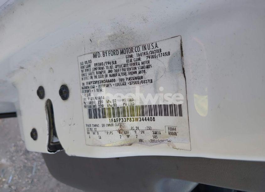 Photo 9 of 2003 Ford Focus LX (VIN 1FAFP33P83W344408)