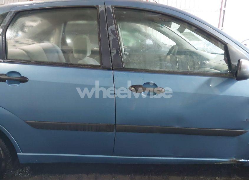 Photo 14 of 2000 Ford Focus LX (VIN 1FAFP33P9YW265353)